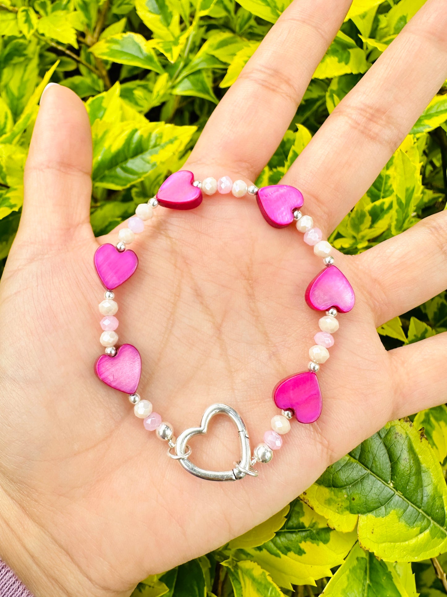 Brazalete Corazones crisolita rosa y cristales